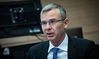 One Minister Wearing Five Hats